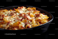 Cheesy Baked Pasta Casserole with Tomato Sauce and Herbs