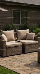 Cozy Backyard Wicker Sofa with Cushions and Glass of Soda