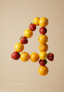 Number four shaped with fresh strawberries and oranges