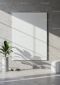 Minimalist living room with blank white canvas and plant