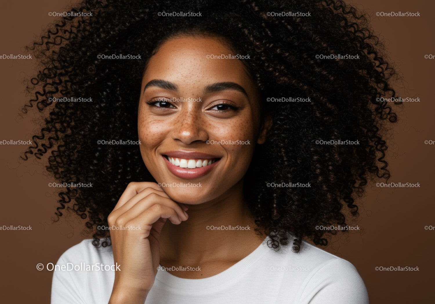 Portrait of a Happy Woman with Curly Hair and Freckles