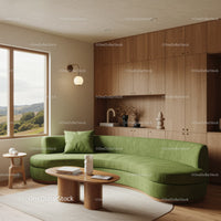 Cozy living room with green curved sofa and wooden decor