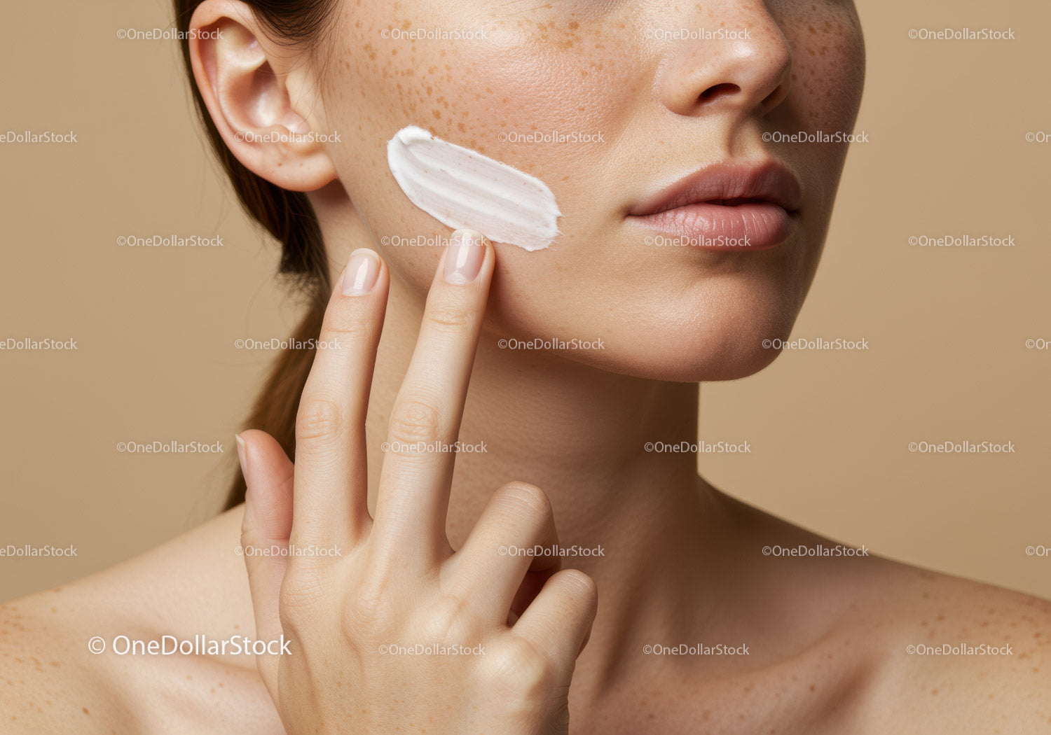 Close-up of Woman Applying Moisturizer on Face for Skincare Routine