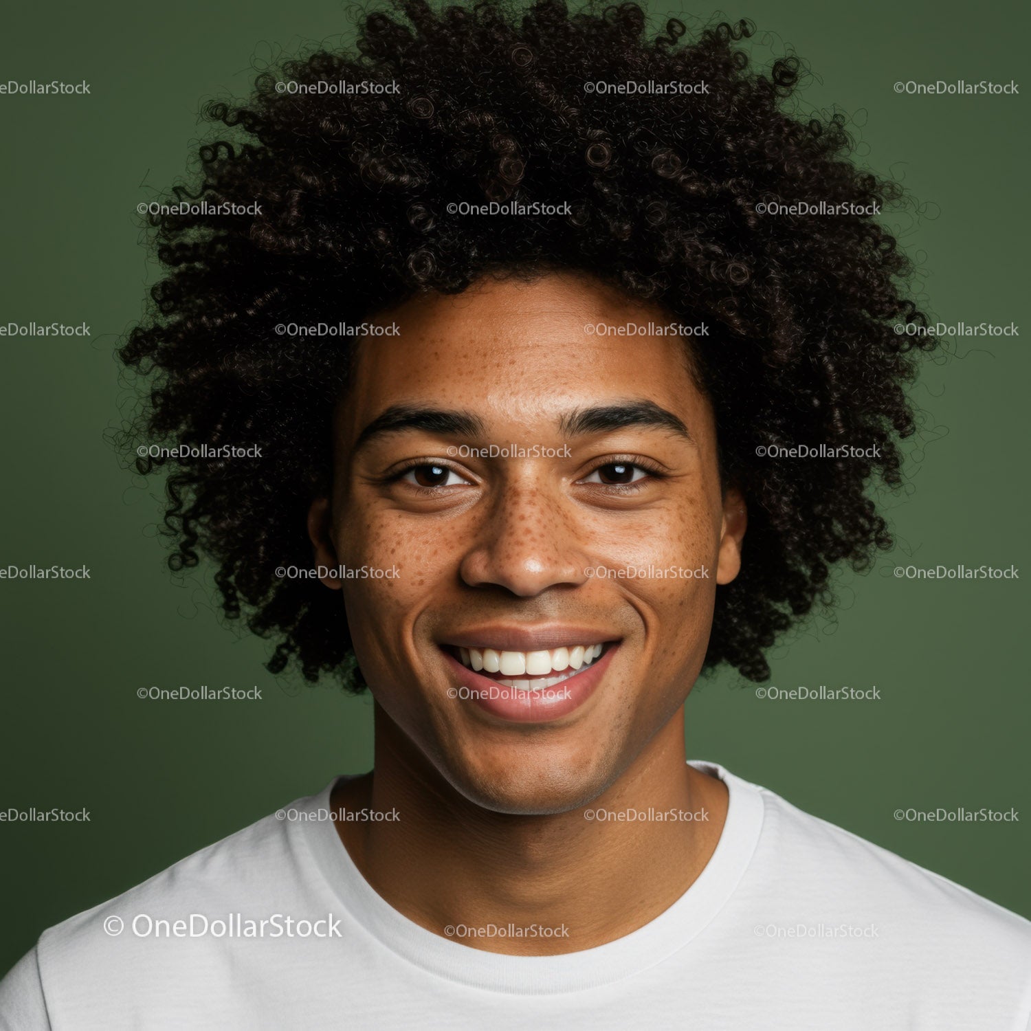 Close-up of Smiling Man with Curly Hair and Bright Expression