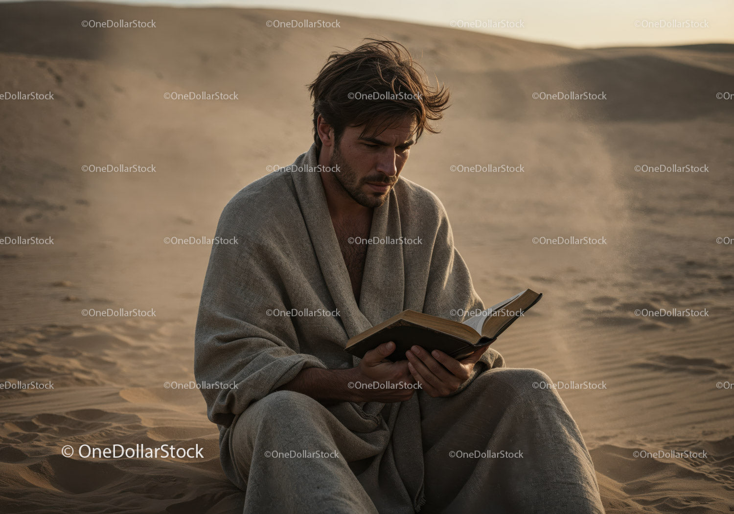Man in Casual Clothing Reading Book in Desert During Dust Storm