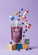 Blueberry smoothie pouch with playful rocket toys and blocks