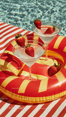 Strawberry Cocktails on Poolside Float in Bright Summer Setting