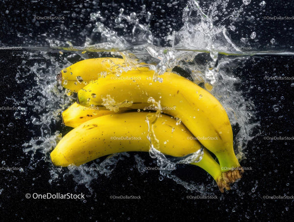 Fresh Ripe Bananas Splashing in Water with Vibrant Color