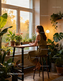 Woman enjoying peaceful moment among indoor plants