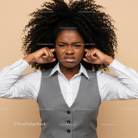 Frustrated Woman Covering Ears with Annoyed Expression