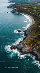 Aerial View of Rocky Coastal Cliffs and Blue Ocean Waves