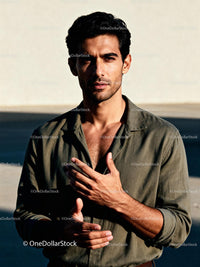 Confident man standing outdoors in natural light