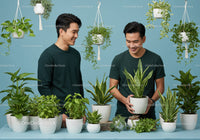 Two men enjoying indoor plants in bright studio