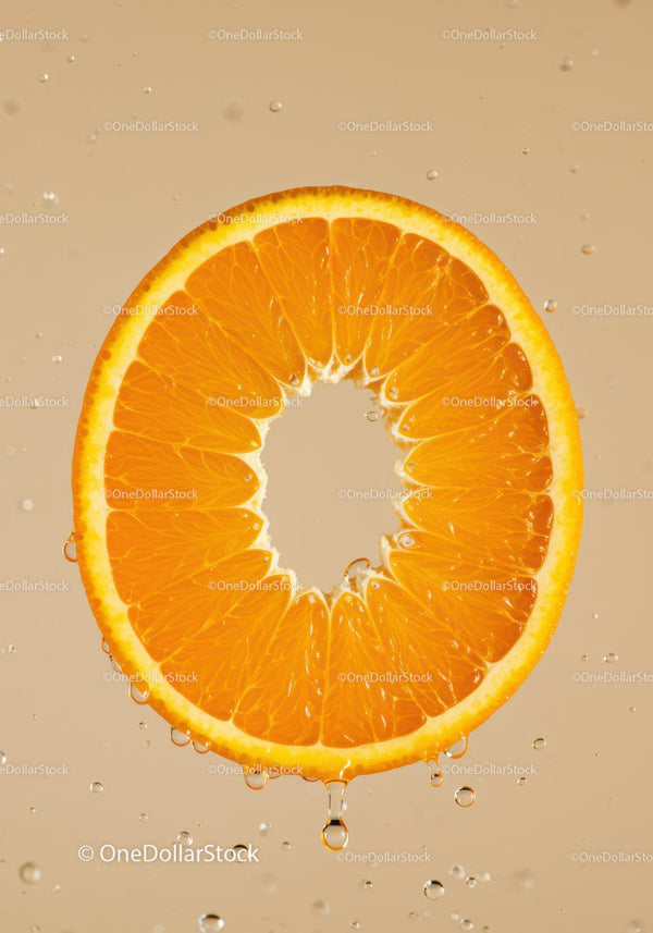 Fresh Orange Slice with Water Drops Closeup