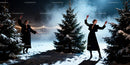 Elegant woman dancing gracefully among snowy fir trees
