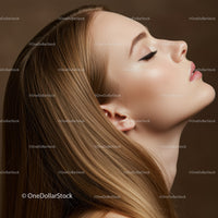 Close-Up Profile of Serene Woman with Flowing Hair