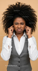Frustrated Woman with Curly Hair Showing Annoyed Facial Expression