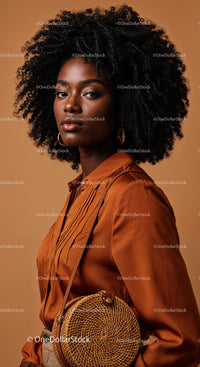 Elegant African American Woman with Curly Hair Wearing Satin Shirt and Round Woven Handbag
