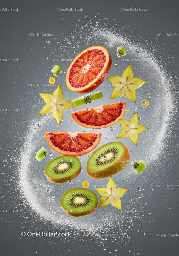 Fresh citrus and tropical fruit slices in water splash