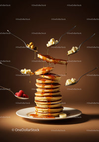 Stack of pancakes dripping golden syrup with fresh fruits