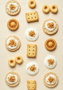 Assorted Light Cookies and Icing on Soft Beige Background