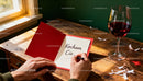 Writing a Love Note by Window with Wine Glass
