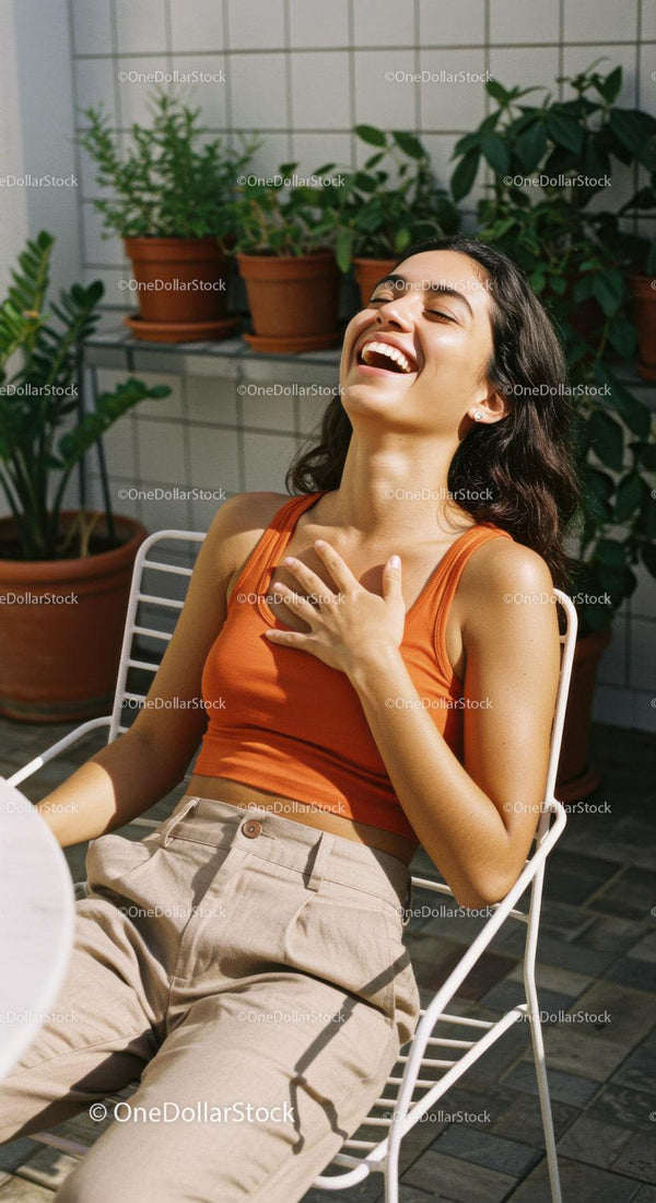Joyful Woman Relaxing Outdoors on Sunny Summer Day