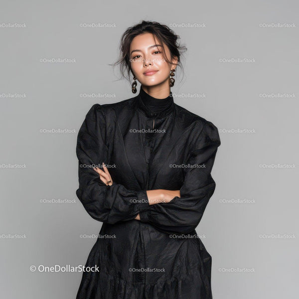 Chic Woman in Elegant Black Dress with Confident Pose