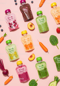 Colorful smoothie pouches with fresh fruits and vegetables