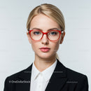 Stylish Blonde Woman Wearing Red Glasses in Professional Portrait