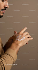 Close Up of a Man Applying Lotion on Hand for Skin Care