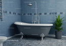 Classic clawfoot bathtub in stylish blue bathroom