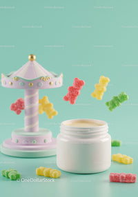 Open white jar with cream and colorful gummy bears