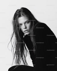 Portrait of a Young Woman with Wet Hair in Black and White Style