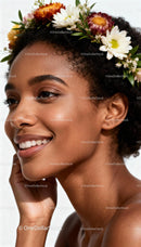Smiling woman with floral crown and glowing skin