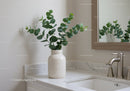 Elegant Eucalyptus in White Vase Beside Modern Kitchen Sink