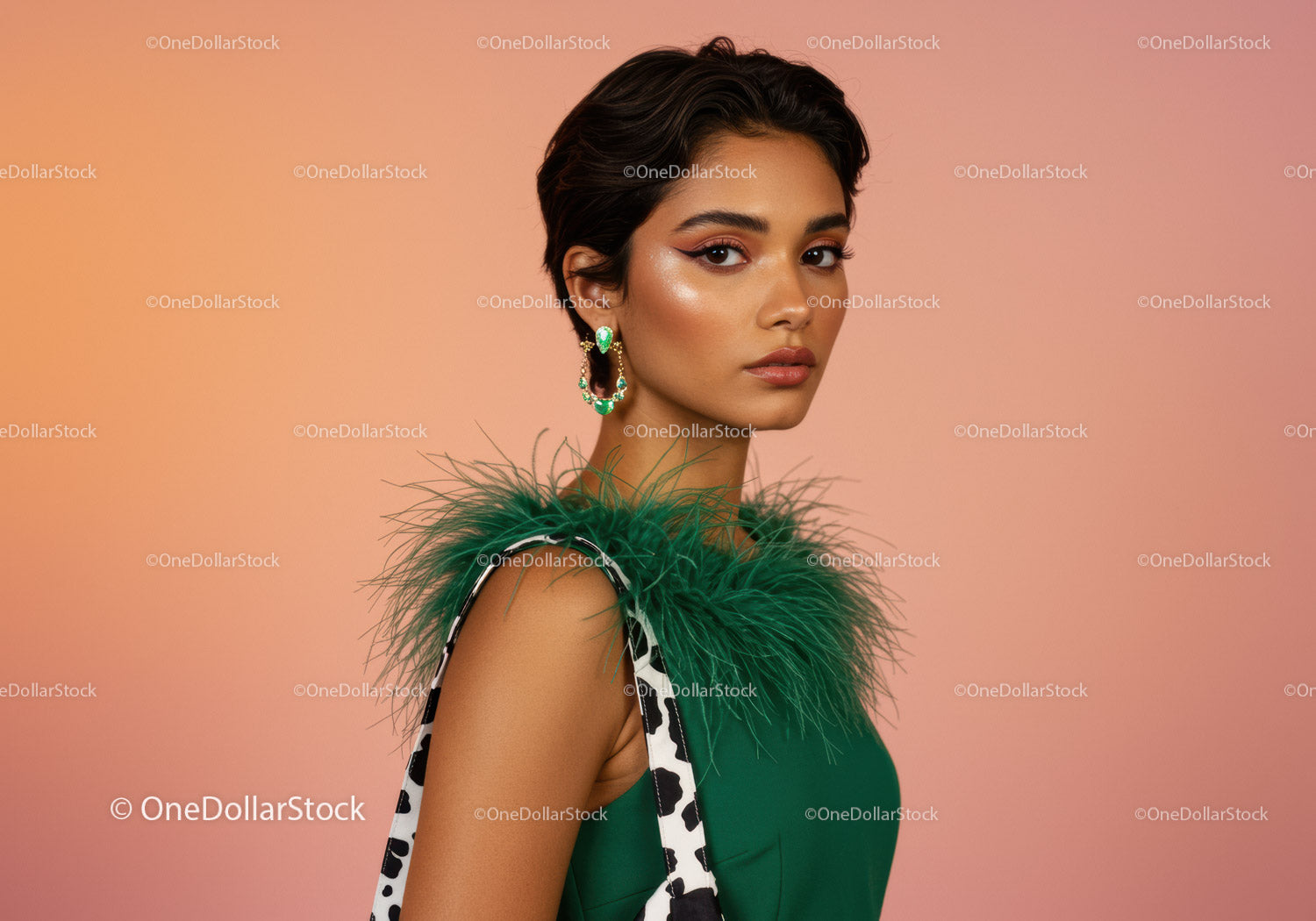 Fashion Model in Green Dress with Feathered Detailing and Jewelry