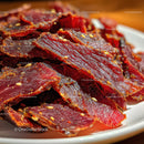 Crispy Beef Jerky Chips with Sesame Seeds in Close-Up