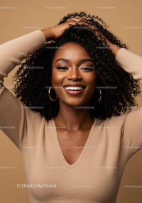Elegant African American Woman with Curly Hair Smiling in Studio