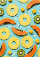 Fresh tropical fruit assortment on blue background