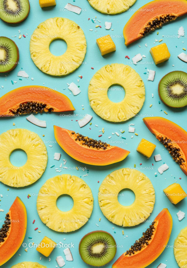 Fresh tropical fruit assortment on blue background