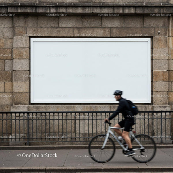 Cyclist passing outdoor blank advertising billboard JPG Mockup Image