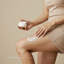 Close-up of Woman Applying Moisturizer to Leg for Skin Care Routine