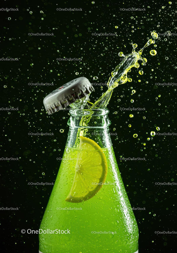 Refreshing Citrus Soda Bottle with Lemon Slice Splash