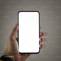 Hand holding smartphone with blank white screen