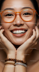 Close-up portrait of smiling woman with orange glasses