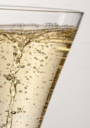 Effervescent Bubbles Rising in Clear Champagne Glass