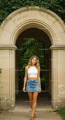 Casual Summer Look of Young Woman in Denim Skirt