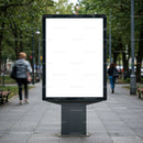 Blank urban billboard on city park walkway