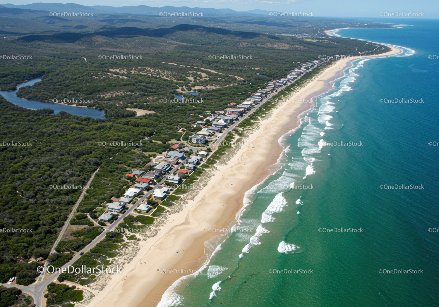 Scenic Beachfront with White Sand and Ocean Waves